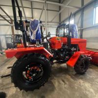 Трактор Уралец 2204 с отвалом для снега